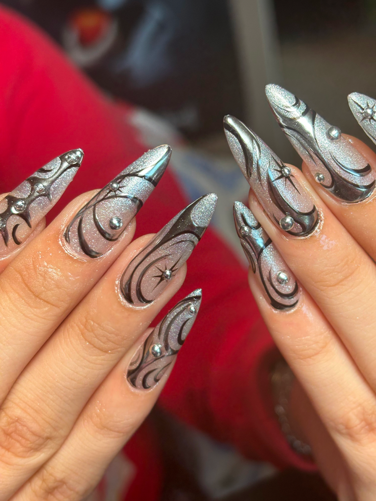 Chrome and Light Glitter Gel-X Nails.