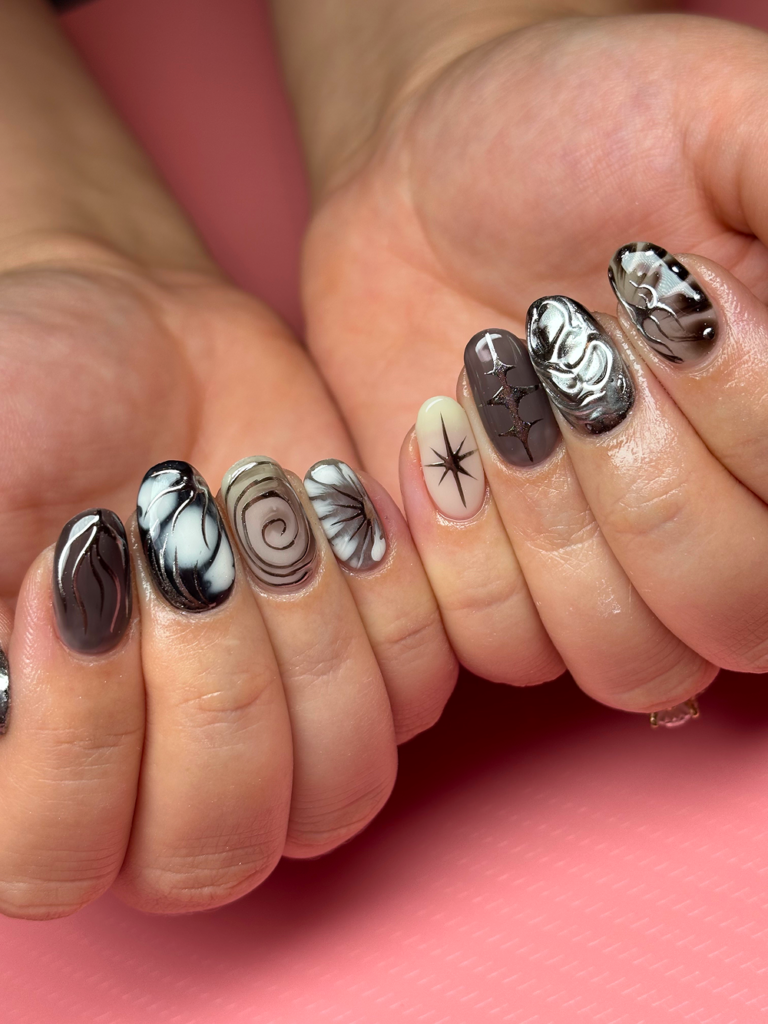 White and chrome cybersigilism builder gel nails.